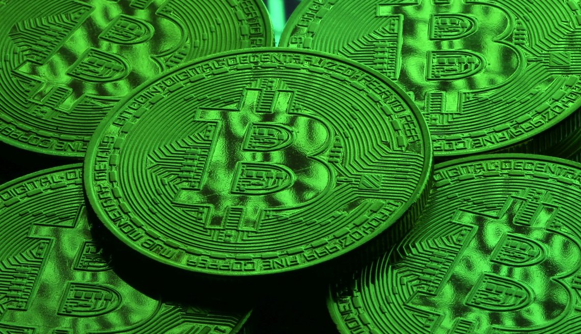 FILE PHOTO: Virtual currency Bitcoin tokens are seen in this illustration picture, December 8, 2017. REUTERS/Dado Ruvic/Illustration/File Photo FILE PHOTO: Virtual currency Bitcoin tokens are seen in this illustration picture, December 8, 2017. REUTERS/Dado Ruvic/Illustration/File Photo