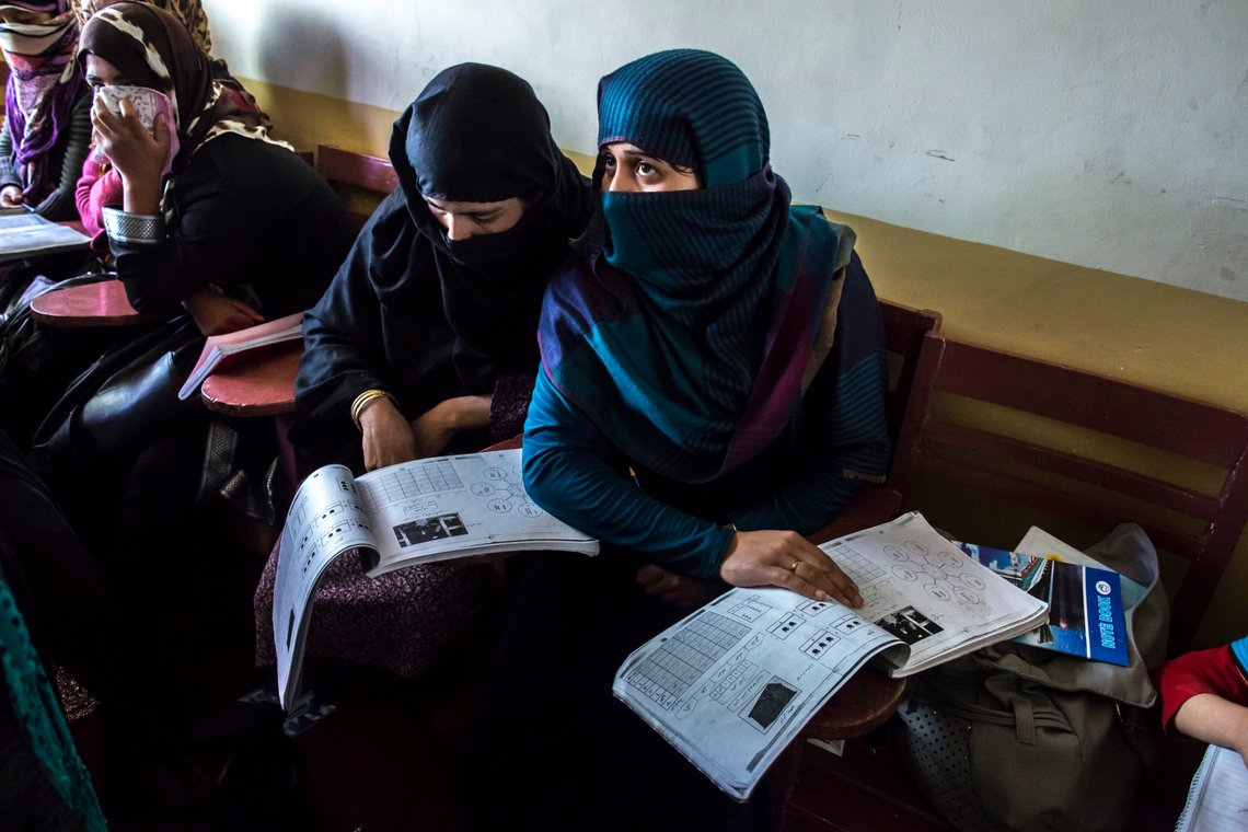 Afghan women take part in a literacy class at the Organisation of Promoting Afghan Women's Capabilities (OPAWC) center in Kabul March 31, 2014. REUTERS/Zohra Bensemra (AFGHANISTAN - Tags: EDUCATION SOCIETY) Afghan women take part in a literacy class at the Organisation of Promoting Afghan Women's Capabilities (OPAWC) center in Kabul March 31, 2014. REUTERS/Zohra Bensemra (AFGHANISTAN - Tags: EDUCATION SOCIETY)
