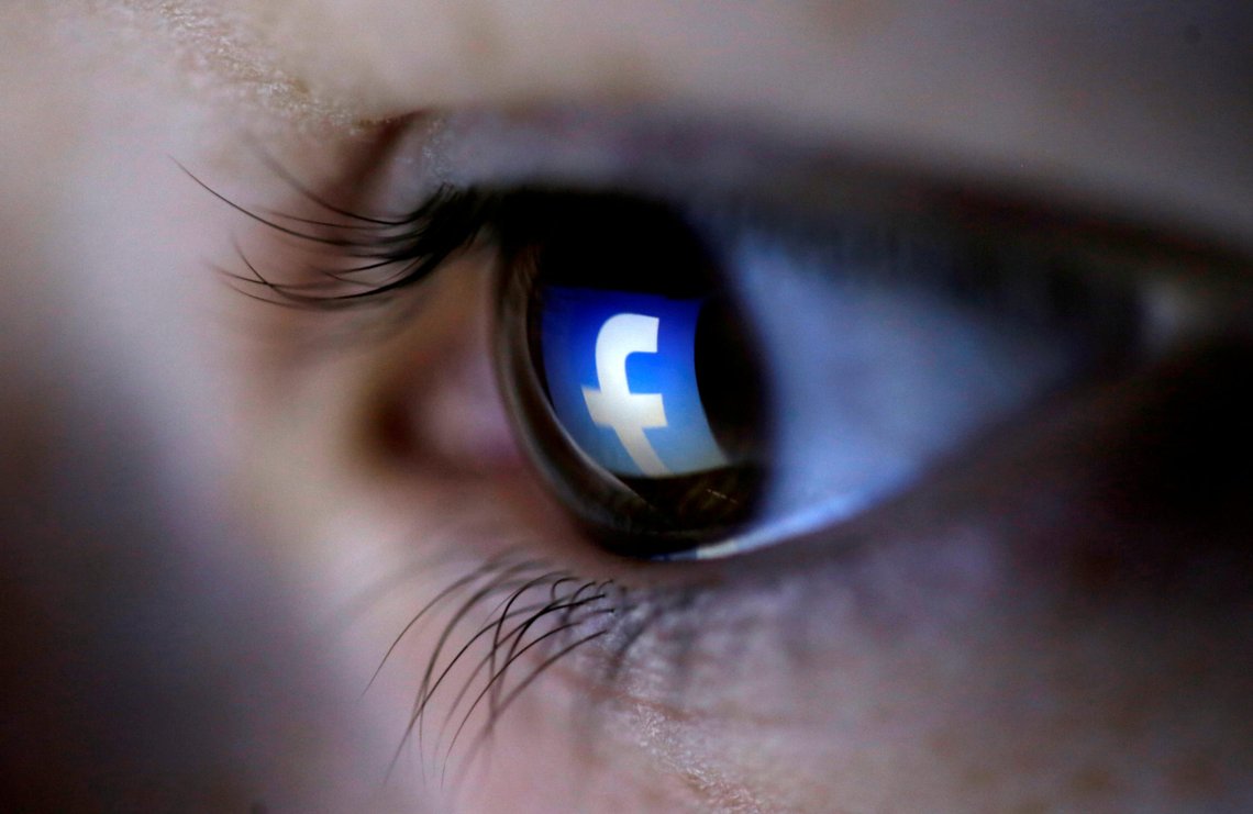 FILE PHOTO: A picture illustration shows a Facebook logo reflected in a person's eye, in Zenica, March 13, 2015. REUTERS/Dado Ruvic/Illustration/File Photo FILE PHOTO: A picture illustration shows a Facebook logo reflected in a person's eye, in Zenica, March 13, 2015. REUTERS/Dado Ruvic/Illustration/File Photo