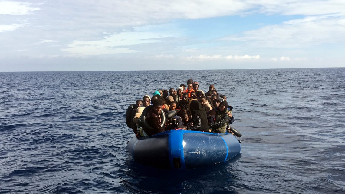 Migrants look on from a rubber boat before being rescued by members of the NGO Proactiva Open Arms who found them while doing drills in the Mediterranean Sea off the coast of southern Spain, October 11, 2018. REUTERS/Stringer NO RESALES. NO ARCHIVES. Migrants look on from a rubber boat before being rescued by members of the NGO Proactiva Open Arms who found them while doing drills in the Mediterranean Sea off the coast of southern Spain, October 11, 2018. REUTERS/Stringer NO RESALES. NO ARCHIVES.