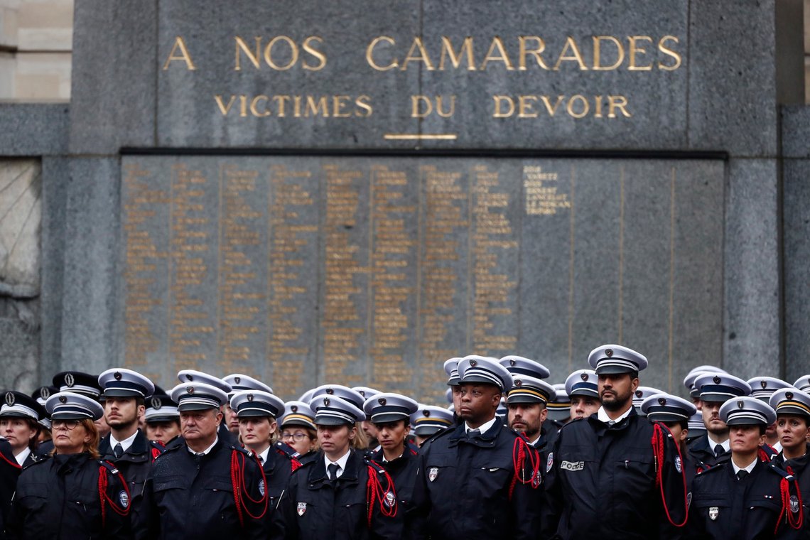 epa07904986 French Police officers stand in front of coffins during a ceremony to pay tribute to the victims of the 03 October knife attack in Paris' Police headquarters, in Paris, France, 08 October 2019. Four officers were killed in a knife attack by Police employee Mickael Harpon on 03 October. EPA/IAN LANGSDON epa07904986 French Police officers stand in front of coffins during a ceremony to pay tribute to the victims of the 03 October knife attack in Paris' Police headquarters, in Paris, France, 08 October 2019. Four officers were killed in a knife attack by Police employee Mickael Harpon on 03 October. EPA/IAN LANGSDON