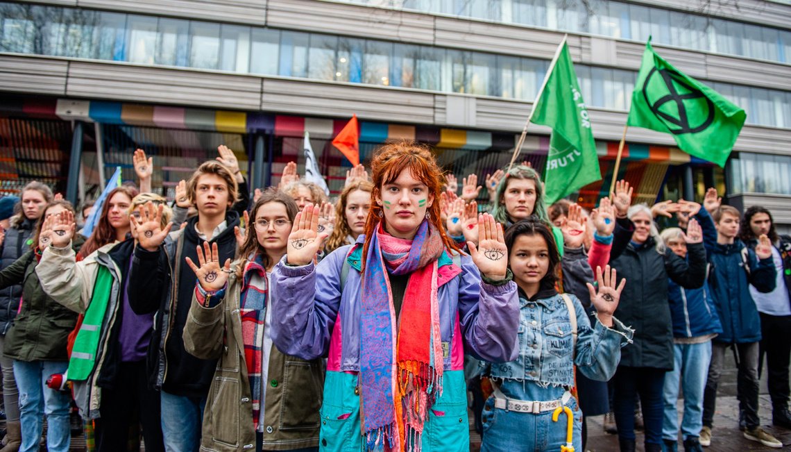 Several climate activists with eyes painted in their palms during the demonstration.People from several climate organisations gathered with eyes painted on their hands symbolising 'We are watching you'. From there they walked to the Tweede Kamer, to demand radical climate action. In front of the Tweede Kamer, the group Extinction Rebellion carried out the performance Blood of our children is on the governments hands. (Photo by Ana Fernandez / SOPA Images/Sipa USA) Several climate activists with eyes painted in their palms during the demonstration.People from several climate organisations gathered with eyes painted on their hands symbolising 'We are watching you'. From there they walked to the Tweede Kamer, to demand radical climate action. In front of the Tweede Kamer, the group Extinction Rebellion carried out the performance Blood of our children is on the governments hands. (Photo by Ana Fernandez / SOPA Images/Sipa USA)