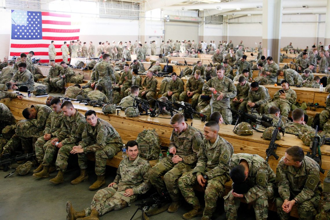 U.S. Army paratroopers assigned to 1st Brigade Combat Team, 82nd Airborne Division prepare to board an aircraft bound for the U.S. Central Command area of operations from Fort Bragg, North Carolina January 5, 2020. Picture taken January 5, 2020. U.S. Army/Spc. Hubert Delany III/Handout via REUTERS. THIS IMAGE HAS BEEN SUPPLIED BY A THIRD PARTY. U.S. Army paratroopers assigned to 1st Brigade Combat Team, 82nd Airborne Division prepare to board an aircraft bound for the U.S. Central Command area of operations from Fort Bragg, North Carolina January 5, 2020. Picture taken January 5, 2020. U.S. Army/Spc. Hubert Delany III/Handout via REUTERS. THIS IMAGE HAS BEEN SUPPLIED BY A THIRD PARTY.