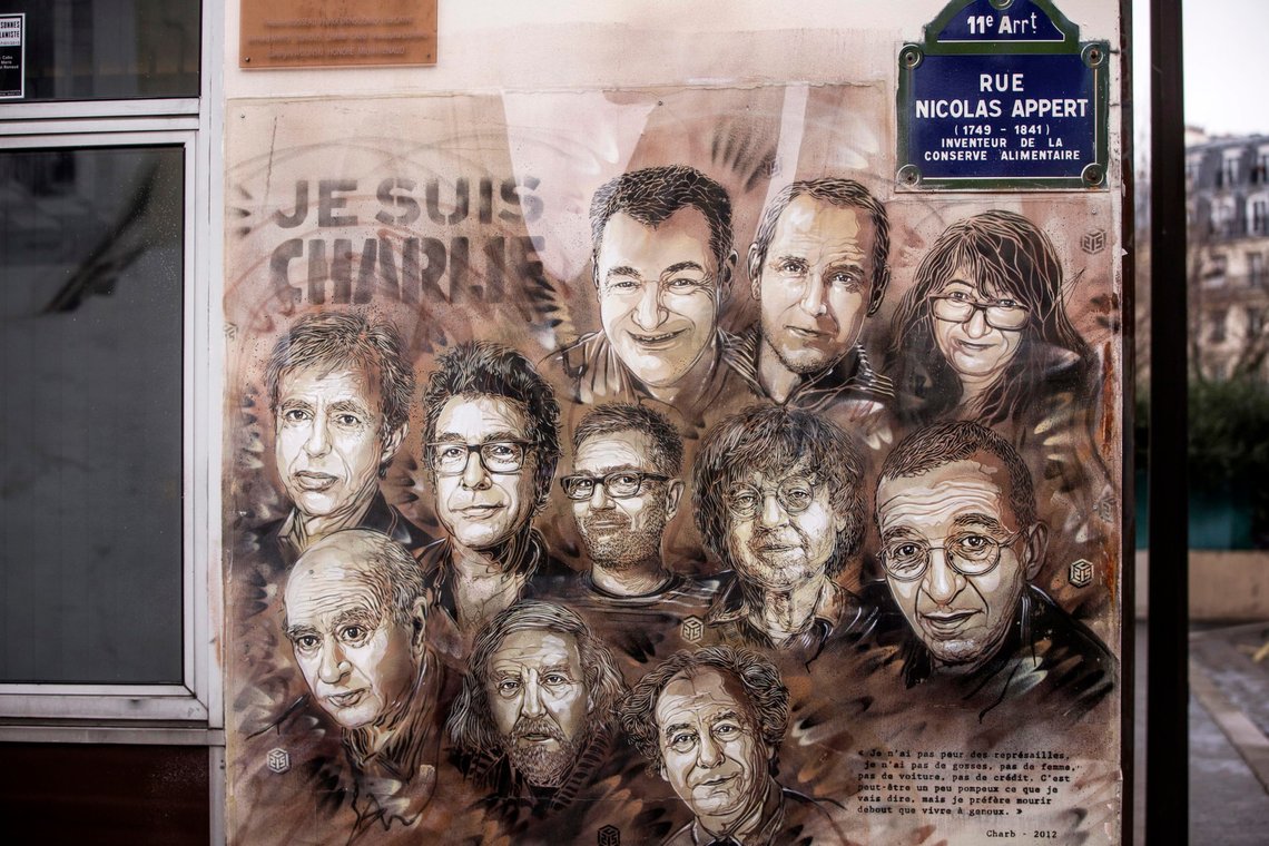epaselect epa08110240 View of a painting depicting Charlie's cartoonists outside the satirical newspaper Charlie Hebdo's former office, on the fifth anniversary of the attack, in Paris, France, 07 January 2020. 07 January 2020 sees the fifth anniversary of a row of terrorist attacks in Paris, with the storming of armed Islamist extremists of the satirical newspaper Charlie Hebdo on 07 January 2015 starting three days of terror in the French capital. EPA/CHRISTOPHE PETIT TESSON epaselect epa08110240 View of a painting depicting Charlie's cartoonists outside the satirical newspaper Charlie Hebdo's former office, on the fifth anniversary of the attack, in Paris, France, 07 January 2020. 07 January 2020 sees the fifth anniversary of a row of terrorist attacks in Paris, with the storming of armed Islamist extremists of the satirical newspaper Charlie Hebdo on 07 January 2015 starting three days of terror in the French capital. EPA/CHRISTOPHE PETIT TESSON