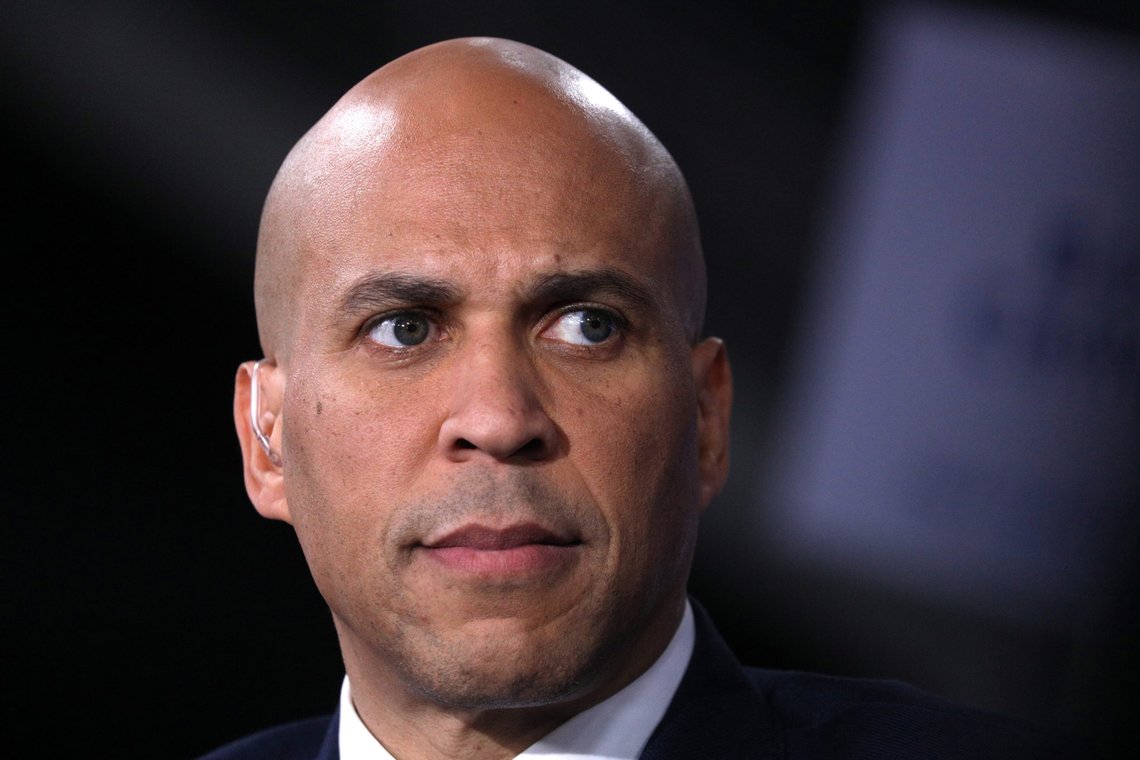 FILE PHOTO: Democratic presidential candidate Senator Cory Booker speaks to news media in the spin room after the conclusion of the fifth 2020 campaign debate at the Tyler Perry Studios in Atlanta, Georgia, U.S., November 20, 2019. REUTERS/Christopher Aluka Berry/File Photo FILE PHOTO: Democratic presidential candidate Senator Cory Booker speaks to news media in the spin room after the conclusion of the fifth 2020 campaign debate at the Tyler Perry Studios in Atlanta, Georgia, U.S., November 20, 2019. REUTERS/Christopher Aluka Berry/File Photo