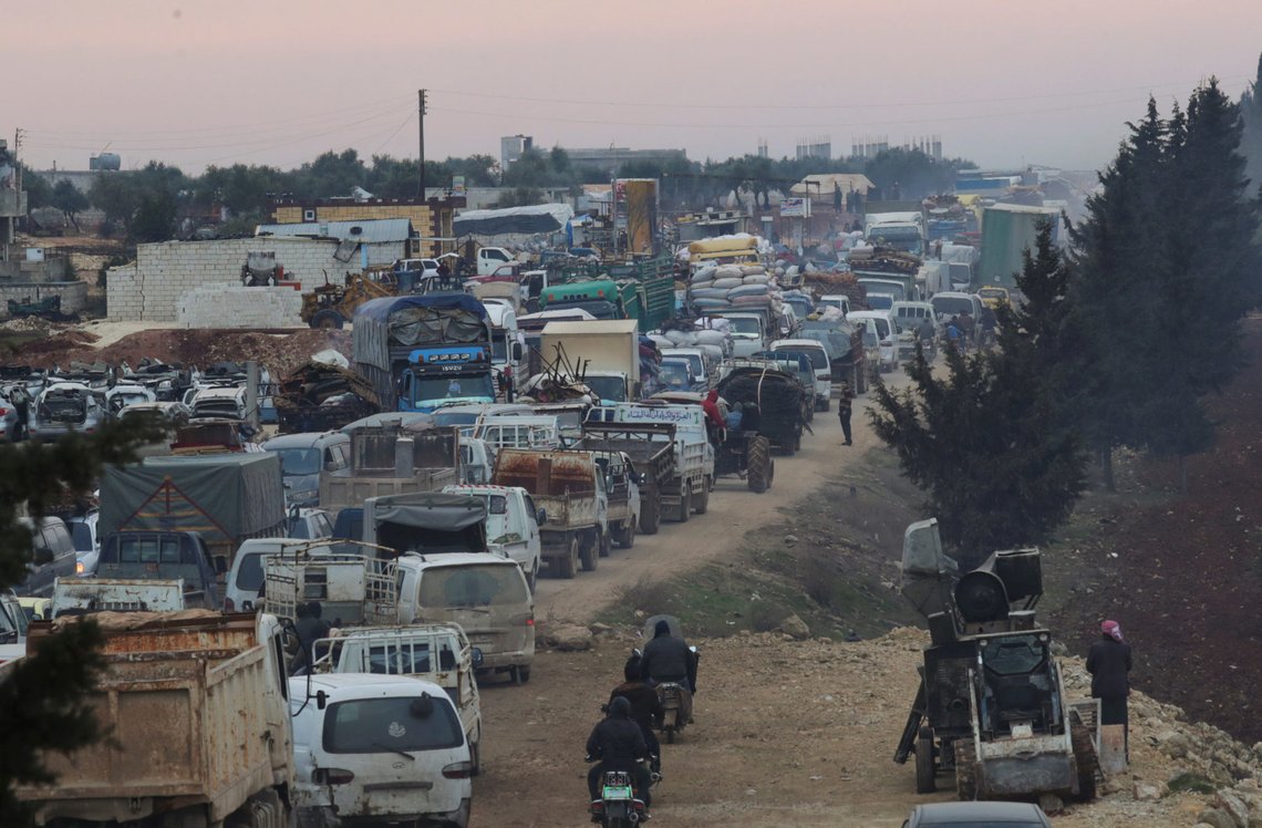 A general view of trucks carrying belongings of displaced Syrians, is pictured in the town of Sarmada in Idlib province, Syria, January 28, 2020. REUTERS/Khalil Ashawi A general view of trucks carrying belongings of displaced Syrians, is pictured in the town of Sarmada in Idlib province, Syria, January 28, 2020. REUTERS/Khalil Ashawi