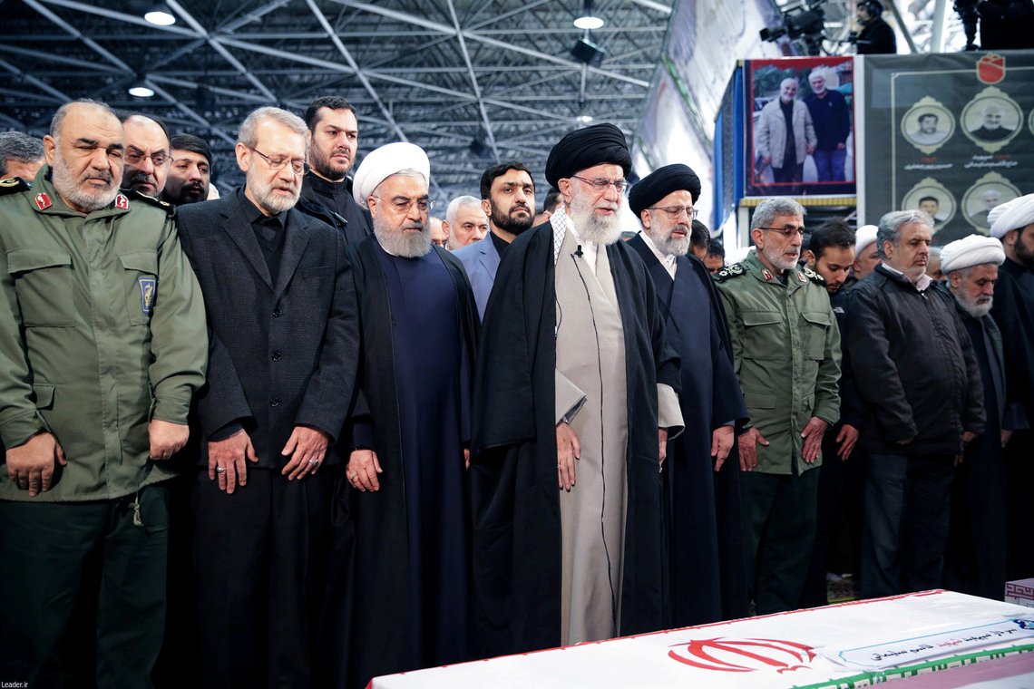 Iran's Supreme Leader Ayatollah Ali Khamenei and Iranian President Hassan Rouhani pray near the coffin of Iranian Major-General Qassem Soleimani, head of the elite Quds Force, who was killed in an air strike at Baghdad airport, in Tehran, Iran, January 6, 2020. Official President's website/Handout via REUTERS ATTENTION EDITORS - THIS IMAGE WAS PROVIDED BY A THIRD PARTY. NO RESALES. NO ARCHIVES TPX IMAGES OF THE DAY Iran's Supreme Leader Ayatollah Ali Khamenei and Iranian President Hassan Rouhani pray near the coffin of Iranian Major-General Qassem Soleimani, head of the elite Quds Force, who was killed in an air strike at Baghdad airport, in Tehran, Iran, January 6, 2020. Official President's website/Handout via REUTERS ATTENTION EDITORS - THIS IMAGE WAS PROVIDED BY A THIRD PARTY. NO RESALES. NO ARCHIVES TPX IMAGES OF THE DAY