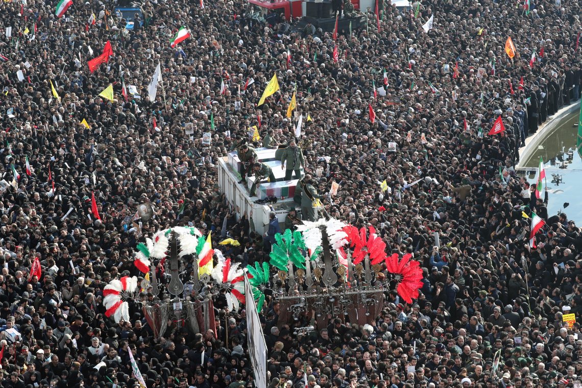 epa08107161 Iranian revolutionary guards surround the coffins of slain Iranian Revolutionary Guards Corps (IRGC) Lieutenant general and commander of the Quds Force Qasem Soleimani and of other victims as thousands of mourners gather to pay tribute for their funeral in Tehran, Iran, 06 January 2020. Soleimanil was killed in a targeted US airstrike on 03 January 2020 in Baghdad, Iraq. EPA/ABEDIN TAHERKENAREH epa08107161 Iranian revolutionary guards surround the coffins of slain Iranian Revolutionary Guards Corps (IRGC) Lieutenant general and commander of the Quds Force Qasem Soleimani and of other victims as thousands of mourners gather to pay tribute for their funeral in Tehran, Iran, 06 January 2020. Soleimanil was killed in a targeted US airstrike on 03 January 2020 in Baghdad, Iraq. EPA/ABEDIN TAHERKENAREH
