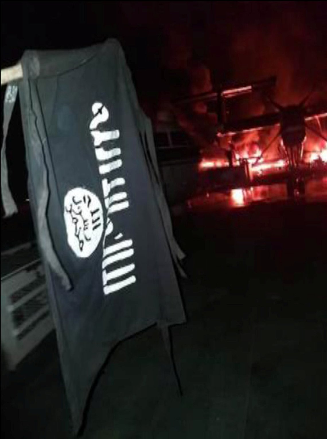 An image distributed by al Shabaab after the attack on a military base in Kenya shows Somalia's al Shabaab militant group's flag, said to be at the Manda Bay Airfield in Manda, Lamu, Kenya January 5, 2020. Al-Shabaab/Handout via REUTERS ATTENTION EDITORS - THIS IMAGE HAS BEEN SUPPLIED BY A THIRD PARTY. NO RESALES. NO ARCHIVES. REUTERS IS UNABLE TO INDEPENDENTLY VERIFY THIS IMAGE. An image distributed by al Shabaab after the attack on a military base in Kenya shows Somalia's al Shabaab militant group's flag, said to be at the Manda Bay Airfield in Manda, Lamu, Kenya January 5, 2020. Al-Shabaab/Handout via REUTERS ATTENTION EDITORS - THIS IMAGE HAS BEEN SUPPLIED BY A THIRD PARTY. NO RESALES. NO ARCHIVES. REUTERS IS UNABLE TO INDEPENDENTLY VERIFY THIS IMAGE.