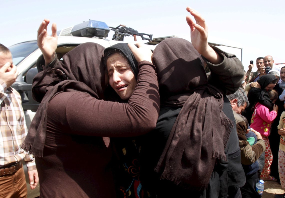 Members of the minority Yazidi sect who were newly released hug each other on the outskirts of Kirkuk April 8, 2015. More than 200 elderly and infirm Yazidis were freed on Wednesday by Islamic State militants who had been holding them captive since overruning their villages in northwestern Iraq last summer. REUTERS/Ako Rasheed TPX IMAGES OF THE DAY Members of the minority Yazidi sect who were newly released hug each other on the outskirts of Kirkuk April 8, 2015. More than 200 elderly and infirm Yazidis were freed on Wednesday by Islamic State militants who had been holding them captive since overruning their villages in northwestern Iraq last summer. REUTERS/Ako Rasheed TPX IMAGES OF THE DAY