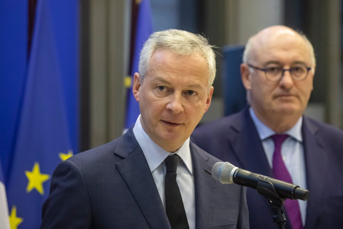 French Finance Minister Bruno Le Maire, left, and European Trade Commissioner Phil Hogan attend a media conference after their meeting in Paris, Tuesday, Jan. 7, 2020. The talks are focused on U.S. tariffs on French wine and other goods. (AP Photo/Michel Euler) French Finance Minister Bruno Le Maire, left, and European Trade Commissioner Phil Hogan attend a media conference after their meeting in Paris, Tuesday, Jan. 7, 2020. The talks are focused on U.S. tariffs on French wine and other goods. (AP Photo/Michel Euler)
