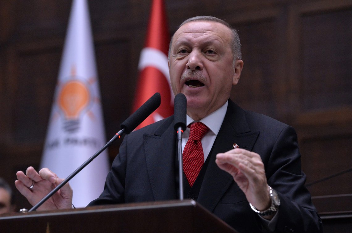 Turkish President Tayyip Erdogan addresses members of his ruling AK Party at the parliament in Ankara, Turkey, February 12, 2020. REUTERS/Stringer NO RESALES. NO ARCHIVES Turkish President Tayyip Erdogan addresses members of his ruling AK Party at the parliament in Ankara, Turkey, February 12, 2020. REUTERS/Stringer NO RESALES. NO ARCHIVES