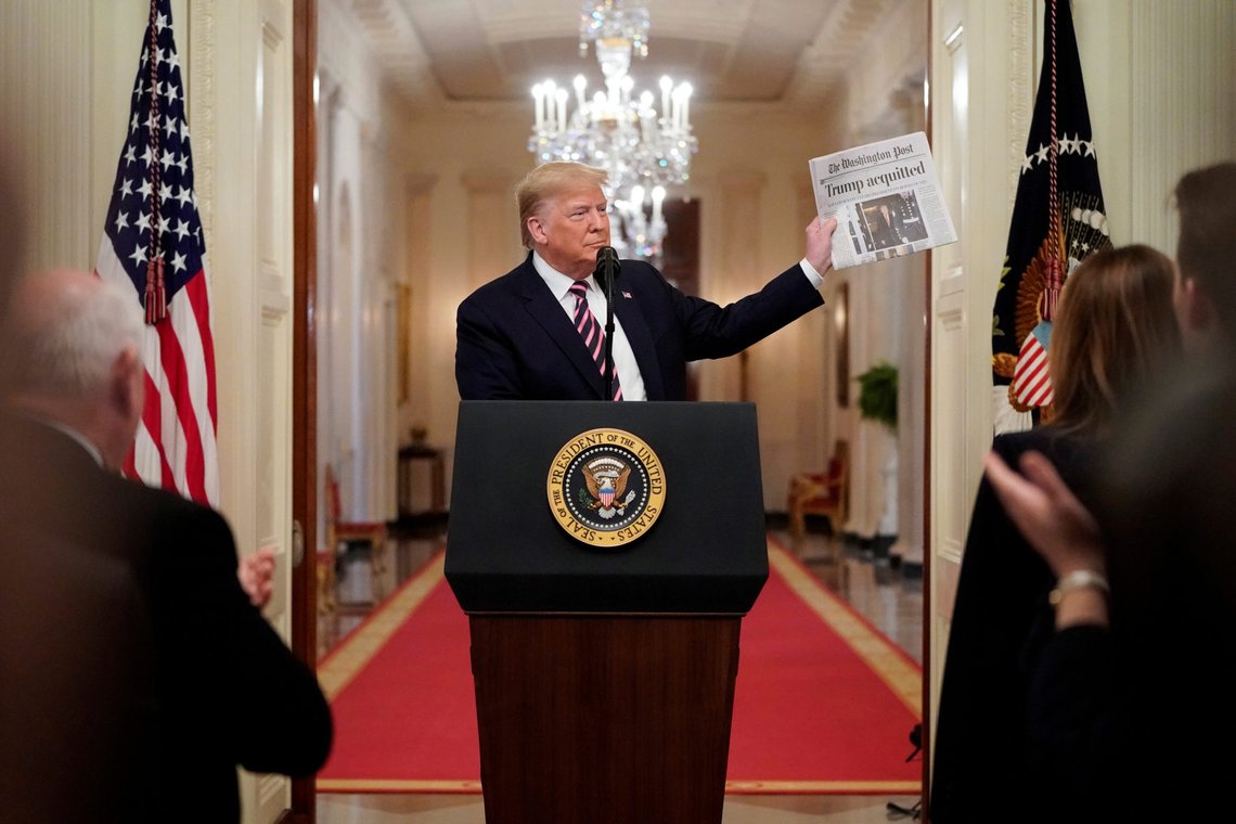 U.S. President Donald Trump holds up a copy of the Washington Post's front page showing news of Trump's acquittal in his Senate impeachment trial, as he delivers a statement about his acquittal in the East Room of the White House in Washington, U.S., February 6, 2020. REUTERS/Joshua Roberts TPX IMAGES OF THE DAY U.S. President Donald Trump holds up a copy of the Washington Post's front page showing news of Trump's acquittal in his Senate impeachment trial, as he delivers a statement about his acquittal in the East Room of the White House in Washington, U.S., February 6, 2020. REUTERS/Joshua Roberts TPX IMAGES OF THE DAY