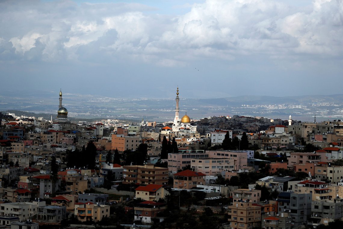 A general view shows the Arab-Israeli city of Umm al-Fahm in the foreground and Wadi Ara in the background, Israel January 30, 2020. Picture taken January 30, 2020. REUTERS/Ammar Awad A general view shows the Arab-Israeli city of Umm al-Fahm in the foreground and Wadi Ara in the background, Israel January 30, 2020. Picture taken January 30, 2020. REUTERS/Ammar Awad