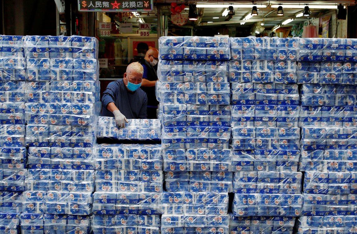 An employee restocks rolls of toilet paper at a market, following the outbreak of the novel coronavirus, in Hong Kong, China February 8, 2020. REUTERS/Tyrone Siu TPX IMAGES OF THE DAY An employee restocks rolls of toilet paper at a market, following the outbreak of the novel coronavirus, in Hong Kong, China February 8, 2020. REUTERS/Tyrone Siu TPX IMAGES OF THE DAY