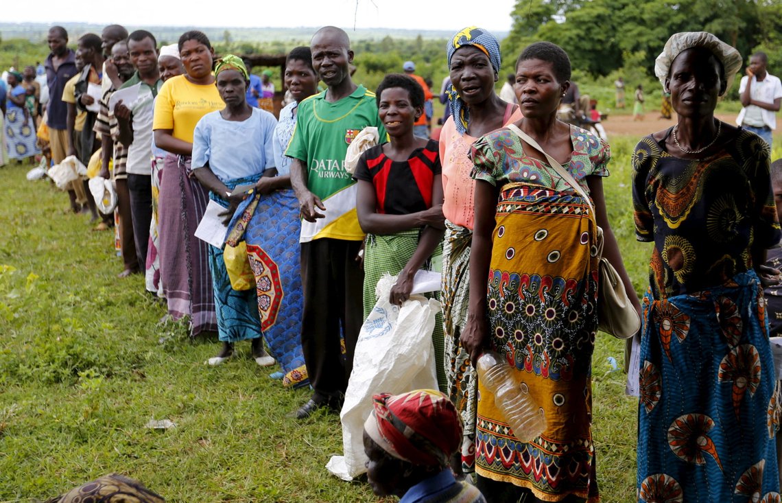 Malawians queue for food aid distributed by the United Nations World Food Progamme (WFP) in Mzumazi village near the capital Lilongwe, February 3, 2016. Late rains in Malawi threaten the staple maize crop and have pushed prices to record highs. About 14 million people face hunger in Southern Africa because of a drought exacerbated by an El Nino weather pattern, according to the WFP. REUTERS/Mike Hutchings Malawians queue for food aid distributed by the United Nations World Food Progamme (WFP) in Mzumazi village near the capital Lilongwe, February 3, 2016. Late rains in Malawi threaten the staple maize crop and have pushed prices to record highs. About 14 million people face hunger in Southern Africa because of a drought exacerbated by an El Nino weather pattern, according to the WFP. REUTERS/Mike Hutchings