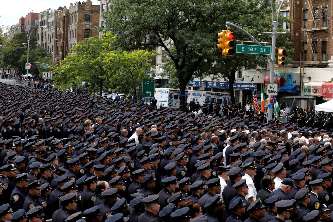 Police officers gather for the funeral service for slain New York City Police Department (NYPD) officer Miosotis Familia in the Bronx borough of New York City, U.S., July 11, 2017. REUTERS/Brendan McDermid Police officers gather for the funeral service for slain New York City Police Department (NYPD) officer Miosotis Familia in the Bronx borough of New York City, U.S., July 11, 2017. REUTERS/Brendan McDermid