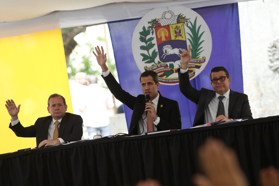 Venezuelan National Assembly President and opposition leader Juan Guaido, who many nations have recognised as the country's rightful interim ruler, takes part in a session of Venezuela's National Assembly with First Vice President Juan Pablo Guanipa and Second Vice President Carlos Berrizbeitia at a square in Caracas, Venezuela February 12, 2020. REUTERS/Manaure Quintero Venezuelan National Assembly President and opposition leader Juan Guaido, who many nations have recognised as the country's rightful interim ruler, takes part in a session of Venezuela's National Assembly with First Vice President Juan Pablo Guanipa and Second Vice President Carlos Berrizbeitia at a square in Caracas, Venezuela February 12, 2020. REUTERS/Manaure Quintero