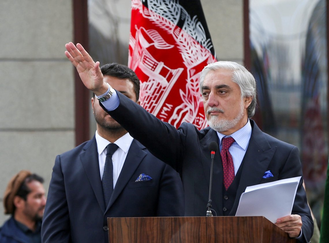 Afghanistan's former CEO Abdullah Abdullah gestures during his swearing-in ceremony as Afghanistan's president, in Kabul, Afghanistan March 9, 2020. REUTERS/Omar Sobhani REFILE - CORRECTING CEREMONY Afghanistan's former CEO Abdullah Abdullah gestures during his swearing-in ceremony as Afghanistan's president, in Kabul, Afghanistan March 9, 2020. REUTERS/Omar Sobhani REFILE - CORRECTING CEREMONY