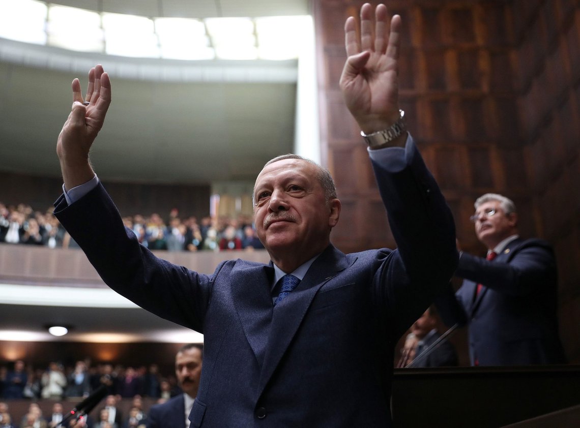 Turkish President Tayyip Erdogan greets members of his ruling AK Party during a meeting at the parliament in Ankara, Turkey, March 11, 2020. Murat Cetinmuhurdar/Presidential Press Office/Handout via REUTERS ATTENTION EDITORS - THIS PICTURE WAS PROVIDED BY A THIRD PARTY. NO RESALES. NO ARCHIVE Turkish President Tayyip Erdogan greets members of his ruling AK Party during a meeting at the parliament in Ankara, Turkey, March 11, 2020. Murat Cetinmuhurdar/Presidential Press Office/Handout via REUTERS ATTENTION EDITORS - THIS PICTURE WAS PROVIDED BY A THIRD PARTY. NO RESALES. NO ARCHIVE