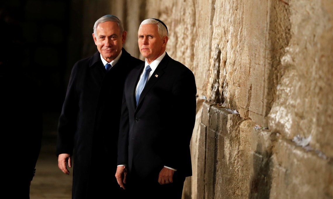 U.S Vice President Mike Pence stands next to Israeli Prime Minister Benjamin Netanyahu during a visit to the Western Wall, Judaism's holiest prayer site, in Jerusalem's Old City January 23, 2020. REUTERS/Ammar Awad U.S Vice President Mike Pence stands next to Israeli Prime Minister Benjamin Netanyahu during a visit to the Western Wall, Judaism's holiest prayer site, in Jerusalem's Old City January 23, 2020. REUTERS/Ammar Awad