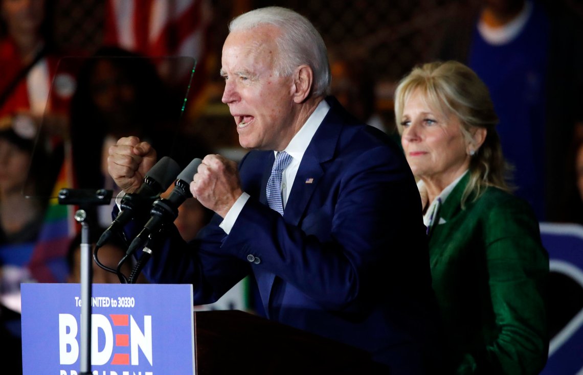 Democratic U.S. presidential candidate and former Vice President Joe Biden addresses supporters as his wife Jill looks on at his Super Tuesday night rally in Los Angeles, California, U.S., March 3, 2020. REUTERS/Mike Blake Democratic U.S. presidential candidate and former Vice President Joe Biden addresses supporters as his wife Jill looks on at his Super Tuesday night rally in Los Angeles, California, U.S., March 3, 2020. REUTERS/Mike Blake