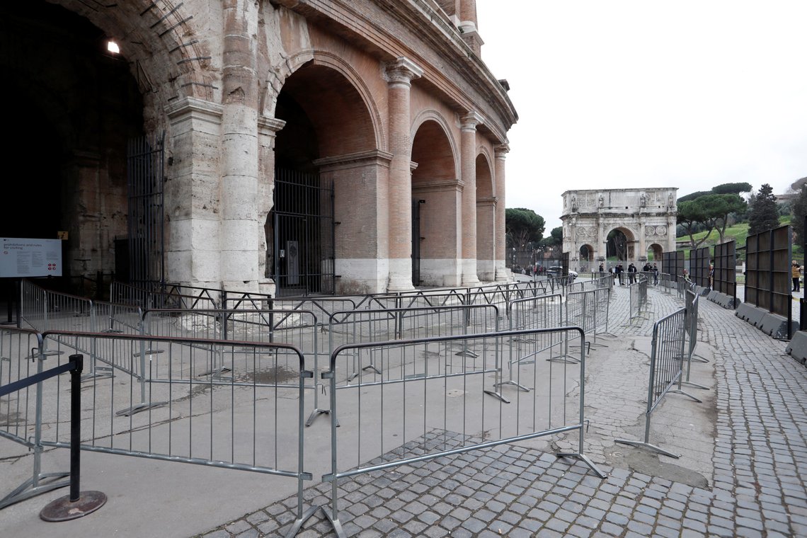 An empty pathway leading to the entrance of the Colosseum, where usually there would be a long queue of tourists waiting, is seen in Rome, Italy, March 2, 2020. Italy's tourism industry has been affected by a coronavirus outbreak, with hotels reporting mass cancellations even in cities with few or no cases of the virus. REUTERS/Remo Casilli An empty pathway leading to the entrance of the Colosseum, where usually there would be a long queue of tourists waiting, is seen in Rome, Italy, March 2, 2020. Italy's tourism industry has been affected by a coronavirus outbreak, with hotels reporting mass cancellations even in cities with few or no cases of the virus. REUTERS/Remo Casilli