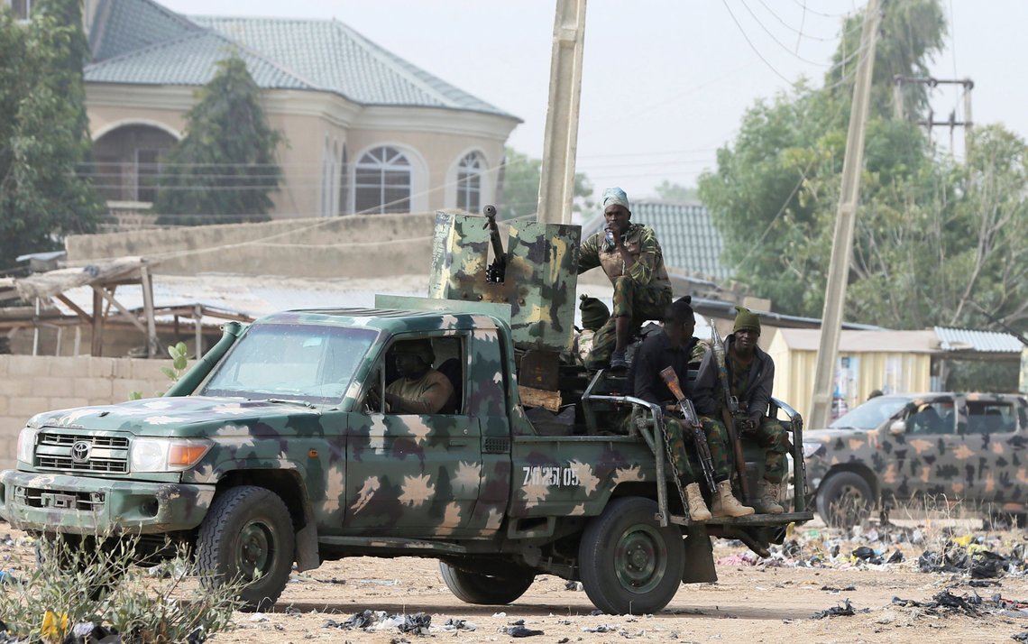 FILE PHOTO: Nigerian military secure an area where a man was killed by suspected militants near Maiduguri, Nigeria, February 16, 2019. REUTERS/Afolabi Sotunde/File Photo FILE PHOTO: Nigerian military secure an area where a man was killed by suspected militants near Maiduguri, Nigeria, February 16, 2019. REUTERS/Afolabi Sotunde/File Photo