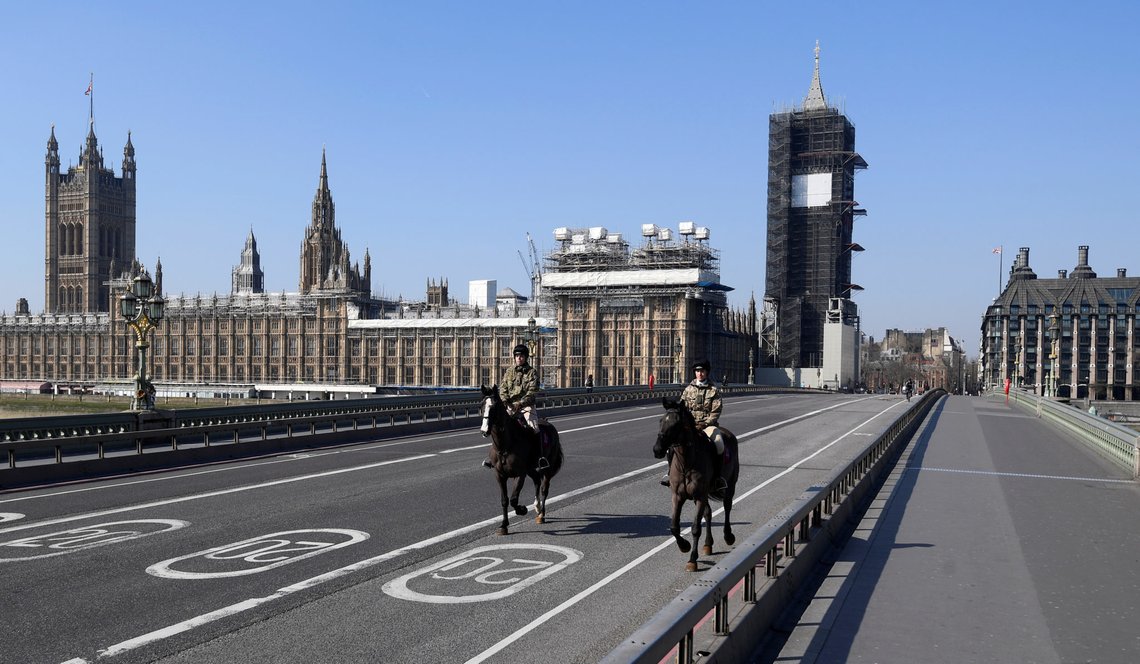 Members of the Household Cavalry ride over an almost empty Westminster bridge as the spread of the coronavirus disease (COVID-19) continues, in London, Britain, March 26, 2020. REUTERS/Toby Melville Members of the Household Cavalry ride over an almost empty Westminster bridge as the spread of the coronavirus disease (COVID-19) continues, in London, Britain, March 26, 2020. REUTERS/Toby Melville