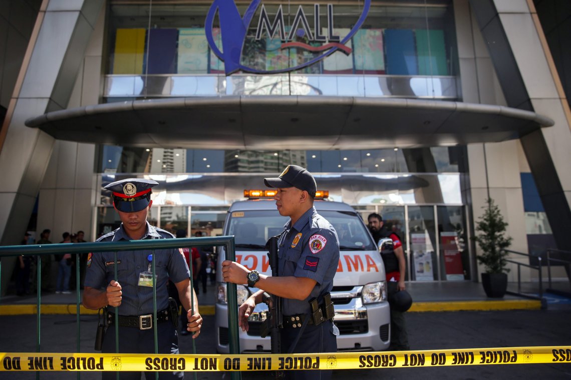 Police officers block the area outside Virra Mall where gunshots were fired, in San Juan City, Metro Manila, Philippines, March 2, 2020. REUTERS/Eloisa Lopez Police officers block the area outside Virra Mall where gunshots were fired, in San Juan City, Metro Manila, Philippines, March 2, 2020. REUTERS/Eloisa Lopez