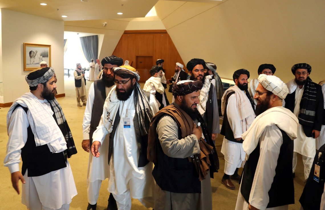 Members of the Taliban delegation gather ahead of an agreement signing between them and U.S. officials in Doha, Qatar February 29, 2020. REUTERS/Ibraheem al Omari Members of the Taliban delegation gather ahead of an agreement signing between them and U.S. officials in Doha, Qatar February 29, 2020. REUTERS/Ibraheem al Omari