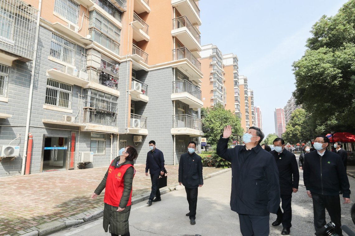 Chinese President Xi Jinping waves to residents who are quarantined at home and sends regards to them at a community in Wuhan, the epicentre of the novel coronavirus outbreak, Hubei province, China March 10, 2020. Picture taken March 10, 2020. Ju Peng/Xinhua via REUTERS ATTENTION EDITORS - THIS IMAGE WAS PROVIDED BY A THIRD PARTY. CHINA OUT. NO RESALES. NO ARCHIVES. Chinese President Xi Jinping waves to residents who are quarantined at home and sends regards to them at a community in Wuhan, the epicentre of the novel coronavirus outbreak, Hubei province, China March 10, 2020. Picture taken March 10, 2020. Ju Peng/Xinhua via REUTERS ATTENTION EDITORS - THIS IMAGE WAS PROVIDED BY A THIRD PARTY. CHINA OUT. NO RESALES. NO ARCHIVES.
