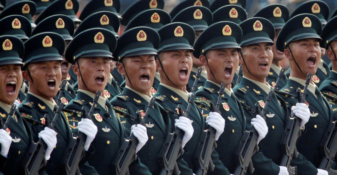 FILE PHOTO: Soldiers of People's Liberation Army (PLA) march in formation past Tiananmen Square during the military parade marking the 70th founding anniversary of People's Republic of China, on its National Day in Beijing, China October 1, 2019. REUTERS/Jason Lee/File Photo FILE PHOTO: Soldiers of People's Liberation Army (PLA) march in formation past Tiananmen Square during the military parade marking the 70th founding anniversary of People's Republic of China, on its National Day in Beijing, China October 1, 2019. REUTERS/Jason Lee/File Photo