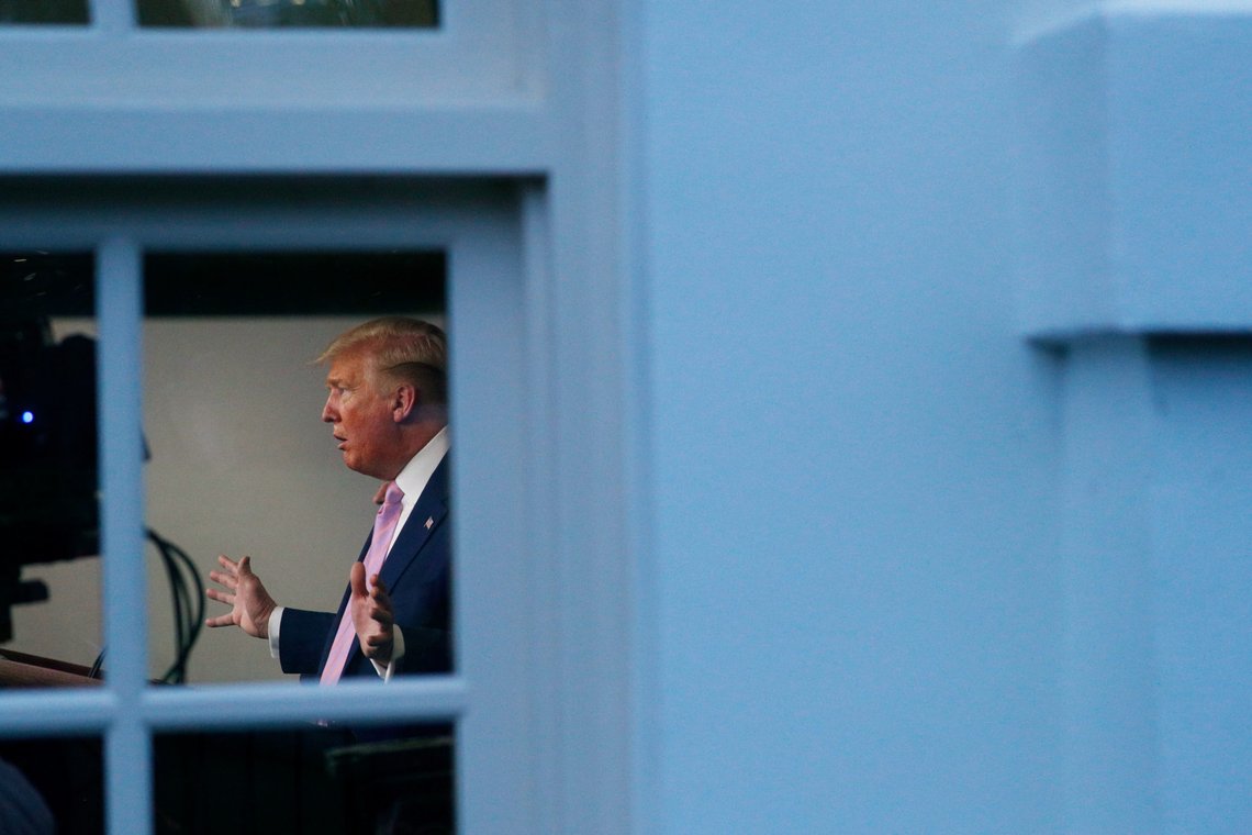 U.S. President Donald Trump addresses the daily coronavirus response briefing in the Brady Press Briefing Room as seen through a window from outside the White House in Washington, U.S., April 1, 2020. REUTERS/Tom Brenner U.S. President Donald Trump addresses the daily coronavirus response briefing in the Brady Press Briefing Room as seen through a window from outside the White House in Washington, U.S., April 1, 2020. REUTERS/Tom Brenner