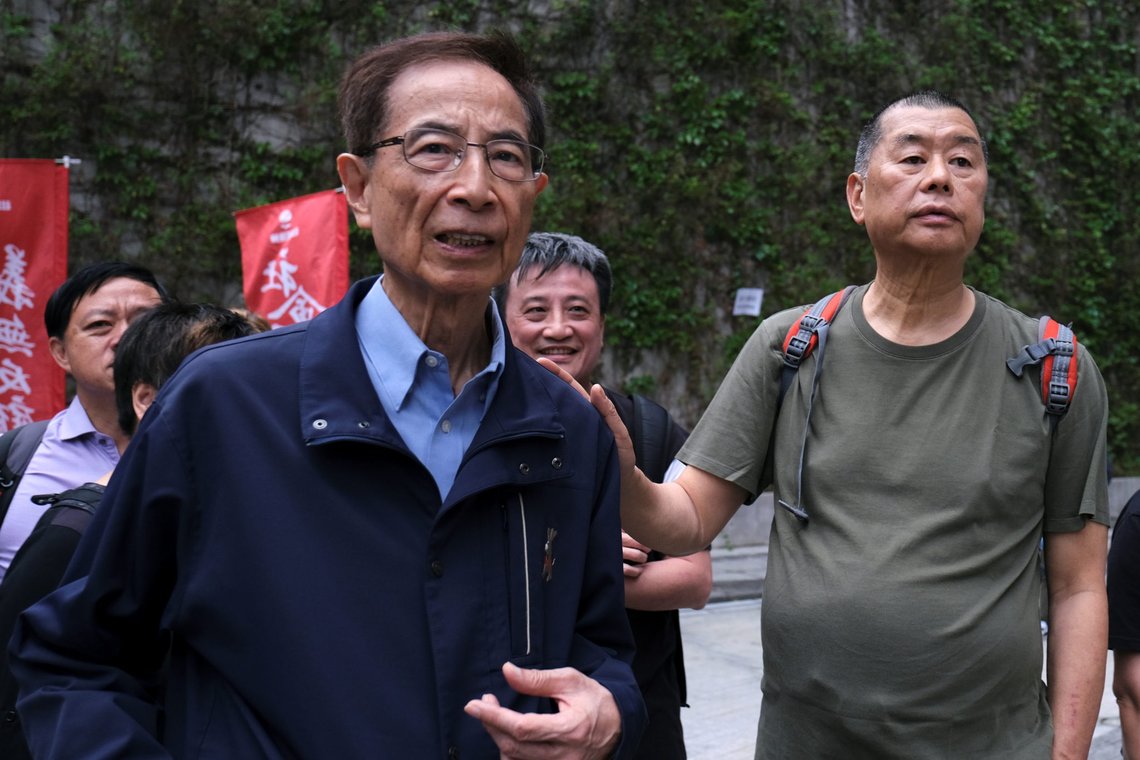 Hong Kong politician Martin Lee and Founder of Next Media Jimmy Lai march during a protest to demand authorities scrap a proposed extradition bill with China, in Hong Kong, China March 31, 2019. REUTERS/Tyrone Siu Hong Kong politician Martin Lee and Founder of Next Media Jimmy Lai march during a protest to demand authorities scrap a proposed extradition bill with China, in Hong Kong, China March 31, 2019. REUTERS/Tyrone Siu