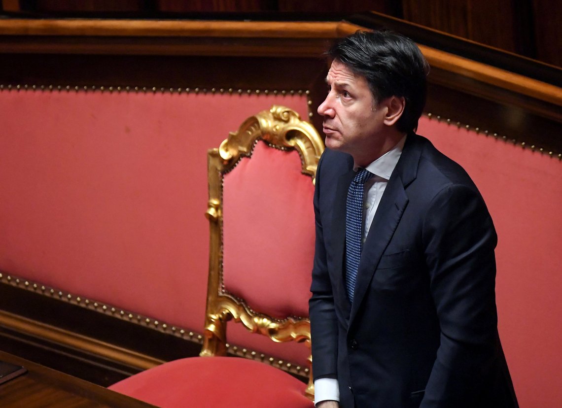 FILE PHOTO: Italian Prime Minister Giuseppe Conte stands during a session in the Senate, the upper house of parliament, on the spread of coronavirus disease (COVID-19), in Rome, Italy, March 26, 2020 REUTERS/Alberto Lingria - RC2NRF9FN84F/File Photo FILE PHOTO: Italian Prime Minister Giuseppe Conte stands during a session in the Senate, the upper house of parliament, on the spread of coronavirus disease (COVID-19), in Rome, Italy, March 26, 2020 REUTERS/Alberto Lingria - RC2NRF9FN84F/File Photo
