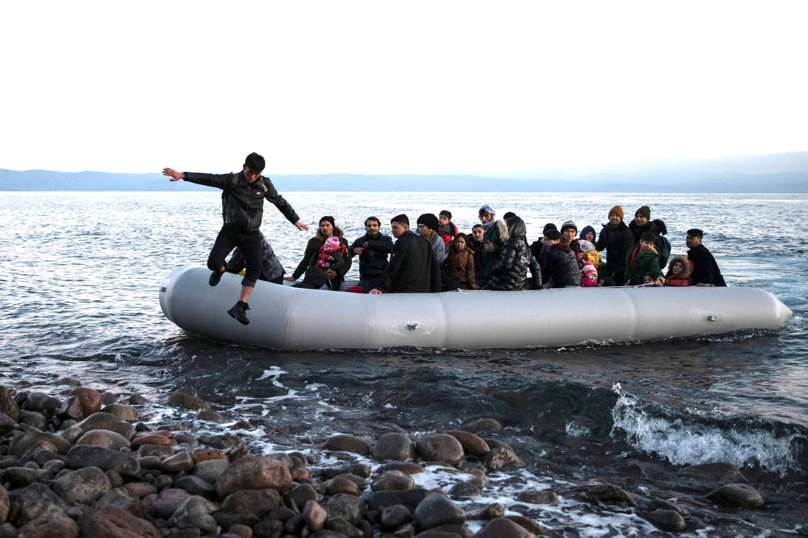 Migrants from Afghanistan arrive on a dinghy on a beach near the village of Skala Sikamias, after crossing part of the Aegean Sea from Turkey to the island of Lesbos, Greece, March 2, 2020. REUTERS/Alkis Konstantinidis Migrants from Afghanistan arrive on a dinghy on a beach near the village of Skala Sikamias, after crossing part of the Aegean Sea from Turkey to the island of Lesbos, Greece, March 2, 2020. REUTERS/Alkis Konstantinidis