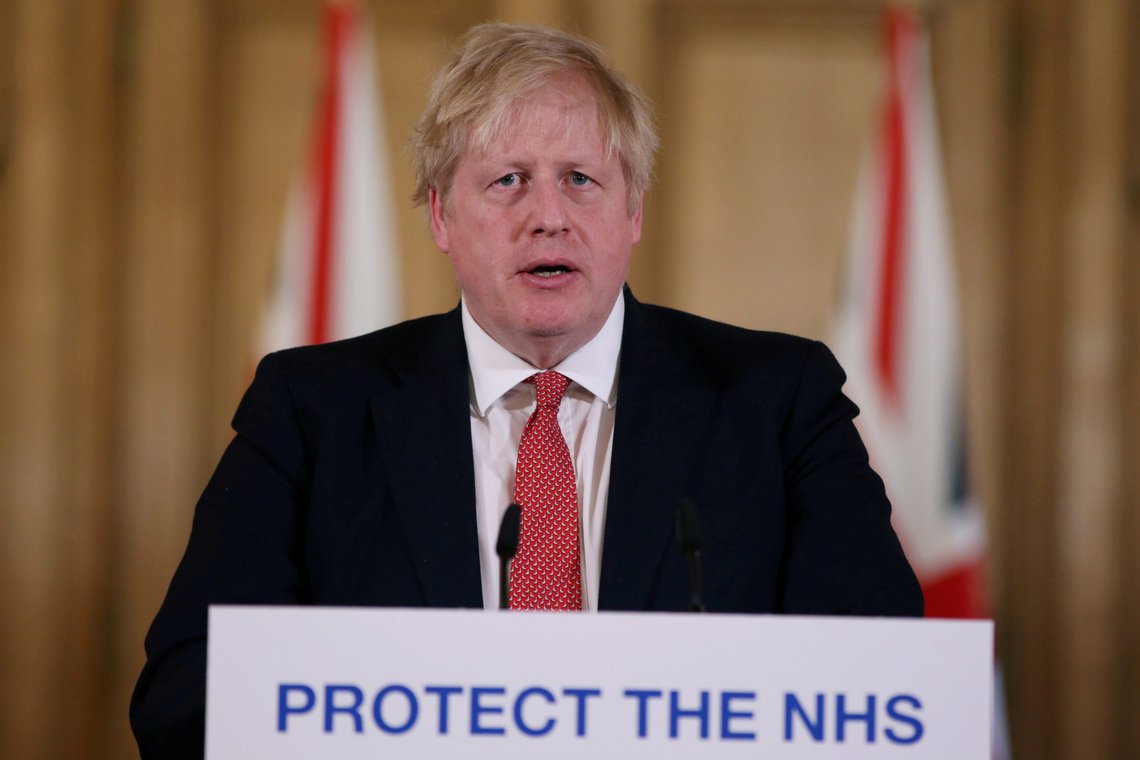 FILE PHOTO: Prime Minister Boris Johnson speaks during a news conference on the ongoing situation with the coronavirus disease (COVID-19) in London, Britain March 22, 2020. Ian Vogler/Pool via REUTERS/File Photo FILE PHOTO: Prime Minister Boris Johnson speaks during a news conference on the ongoing situation with the coronavirus disease (COVID-19) in London, Britain March 22, 2020. Ian Vogler/Pool via REUTERS/File Photo