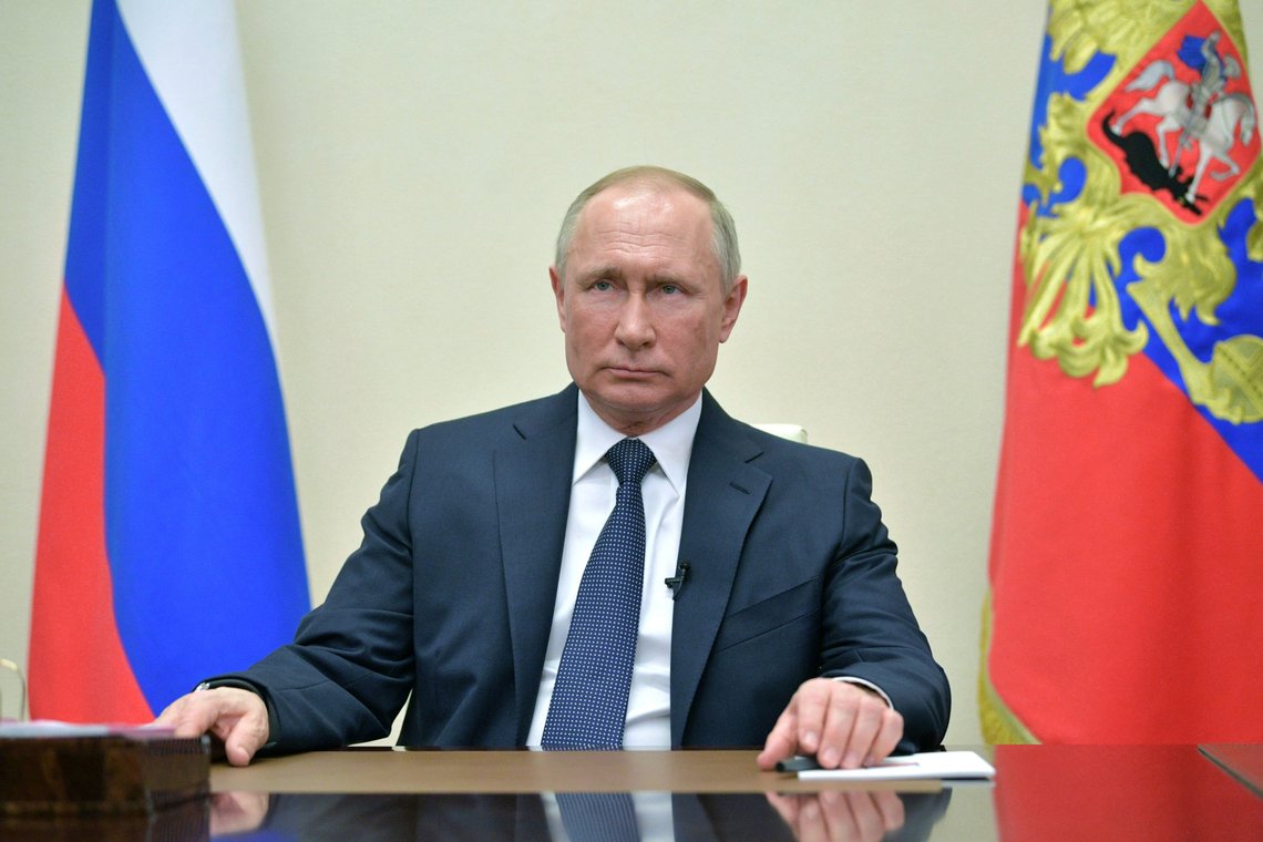 Russian President Vladimir Putin delivers a televised address to the nation about the coronavirus disease (COVID-19) outbreak, at the Novo-Ogaryovo state residence outside Moscow, Russia April 2, 2020. Sputnik/Alexei Druzhinin/Kremlin via REUTERS ATTENTION EDITORS - THIS IMAGE WAS PROVIDED BY A THIRD PARTY. Russian President Vladimir Putin delivers a televised address to the nation about the coronavirus disease (COVID-19) outbreak, at the Novo-Ogaryovo state residence outside Moscow, Russia April 2, 2020. Sputnik/Alexei Druzhinin/Kremlin via REUTERS ATTENTION EDITORS - THIS IMAGE WAS PROVIDED BY A THIRD PARTY.