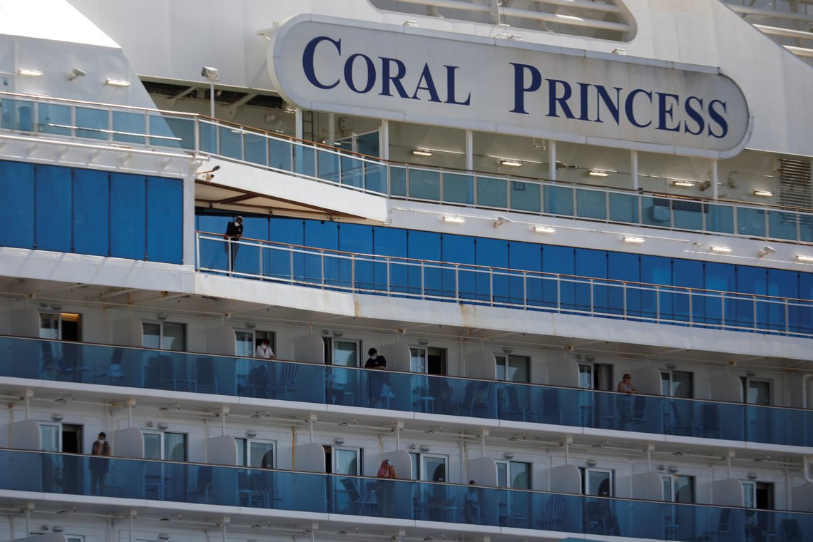 Passengers are seen aboard the Coral Princess ship, of Princess Cruises fleet, with patients affected by coronavirus disease (COVID-19), as it docks at Miami Port, in Miami, Florida, U.S., April 4, 2020. REUTERS/Marco Bello Passengers are seen aboard the Coral Princess ship, of Princess Cruises fleet, with patients affected by coronavirus disease (COVID-19), as it docks at Miami Port, in Miami, Florida, U.S., April 4, 2020. REUTERS/Marco Bello