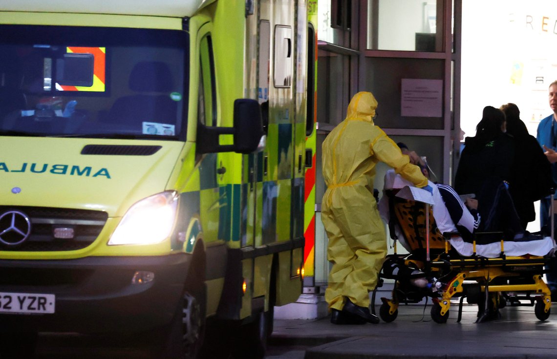 A medical worker pushes a patient on a stretcher outside Royal Liverpool University Hospital as the spread of the coronavirus disease (COVID-19) continues, Liverpool, Britain, April 2, 2020. REUTERS/Phil Noble A medical worker pushes a patient on a stretcher outside Royal Liverpool University Hospital as the spread of the coronavirus disease (COVID-19) continues, Liverpool, Britain, April 2, 2020. REUTERS/Phil Noble