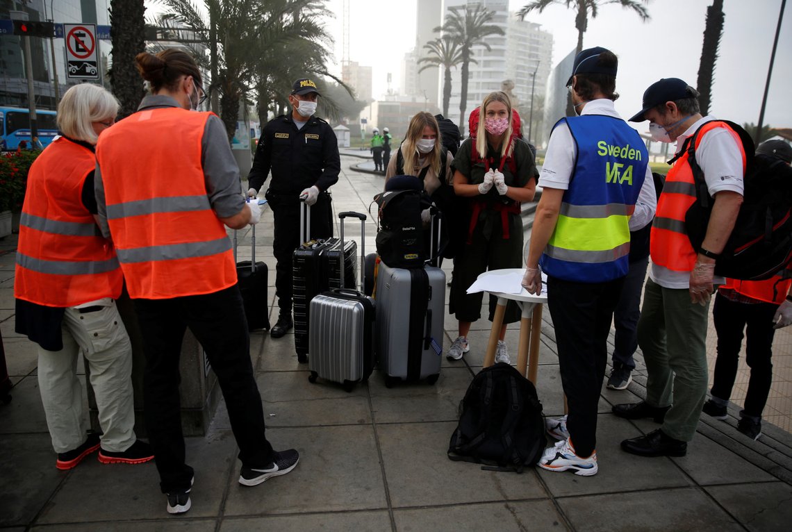 People register for a repatriation flight bound for Sweden and organized by the Swedish embassy for citizens stranded in Peru, during the outbreak of the coronavirus disease (COVID-19), in Lima, Peru April 7, 2020. REUTERS/Sebastian Castaneda NO RESALES. NO ARCHIVES People register for a repatriation flight bound for Sweden and organized by the Swedish embassy for citizens stranded in Peru, during the outbreak of the coronavirus disease (COVID-19), in Lima, Peru April 7, 2020. REUTERS/Sebastian Castaneda NO RESALES. NO ARCHIVES