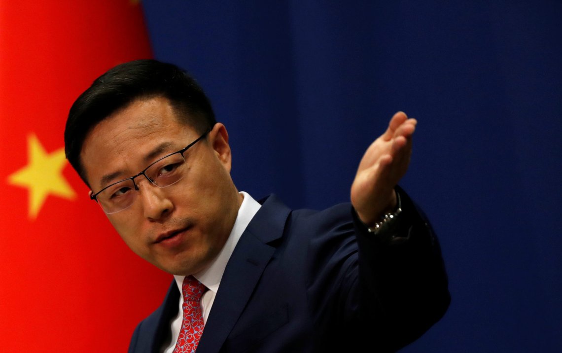 Chinese Foreign Ministry spokesman Zhao Lijian attends a news conference in Beijing, China April 8, 2020. REUTERS/Carlos Garcia Rawlins Chinese Foreign Ministry spokesman Zhao Lijian attends a news conference in Beijing, China April 8, 2020. REUTERS/Carlos Garcia Rawlins