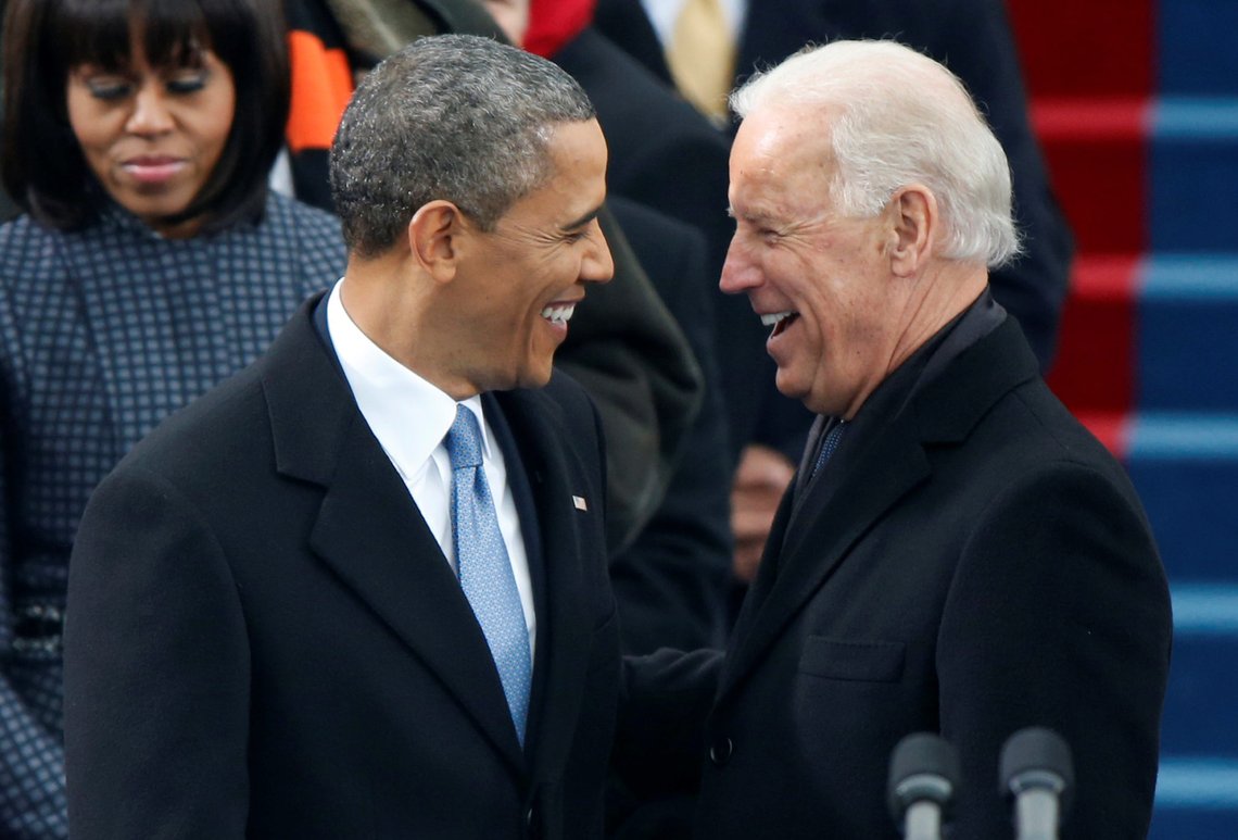 FILE PHOTO: U.S. President Barack Obama is greeted by Vice President Joe Biden as he arrives for his swearing-in during the presidential inauguration ceremonies as first lady Michelle Obama looks on at the U.S. Capitol in Washington, U.S. January 21, 2013. REUTERS/Jason Reed/File Photo FILE PHOTO: U.S. President Barack Obama is greeted by Vice President Joe Biden as he arrives for his swearing-in during the presidential inauguration ceremonies as first lady Michelle Obama looks on at the U.S. Capitol in Washington, U.S. January 21, 2013. REUTERS/Jason Reed/File Photo