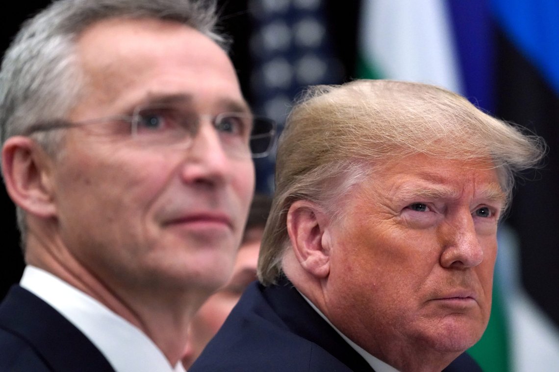 U.S. President Donald Trump reacts next to NATO Secretary General Jens Stoltenberg as they attend a working lunch during the NATO leaders summit in Watford, Britain, December 4, 2019. REUTERS/Kevin Lamarque U.S. President Donald Trump reacts next to NATO Secretary General Jens Stoltenberg as they attend a working lunch during the NATO leaders summit in Watford, Britain, December 4, 2019. REUTERS/Kevin Lamarque
