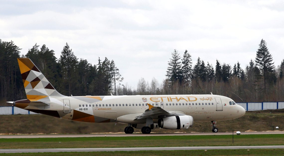 FILE PHOTO: Etihad Airways Airbus A320-200 plane is seen at the National Airport Minsk, Belarus April 19, 2018. REUTERS/Vasily Fedosenko/File Photo FILE PHOTO: Etihad Airways Airbus A320-200 plane is seen at the National Airport Minsk, Belarus April 19, 2018. REUTERS/Vasily Fedosenko/File Photo