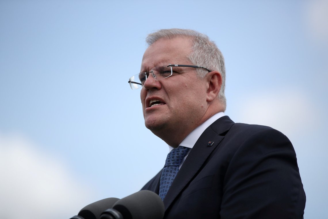 FILE PHOTO: Australian Prime Minister Scott Morrison speaks during a joint press conference held with New Zealand Prime Minister Jacinda Ardern at Admiralty House in Sydney, Australia, February 28, 2020. REUTERS/Loren Elliott/File Photo FILE PHOTO: Australian Prime Minister Scott Morrison speaks during a joint press conference held with New Zealand Prime Minister Jacinda Ardern at Admiralty House in Sydney, Australia, February 28, 2020. REUTERS/Loren Elliott/File Photo