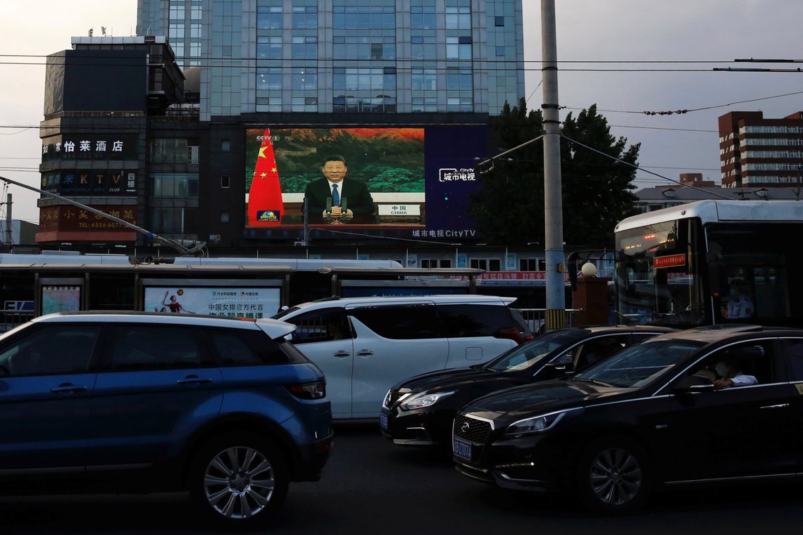 A giant screen displays news footage of Chinese President Xi Jinping speaking via video link to the World Health Assembly (WHO), following the coronavirus disease (COVID-19) outbreak, in Beijing, China May 19, 2020. REUTERS/Tingshu Wang A giant screen displays news footage of Chinese President Xi Jinping speaking via video link to the World Health Assembly (WHO), following the coronavirus disease (COVID-19) outbreak, in Beijing, China May 19, 2020. REUTERS/Tingshu Wang