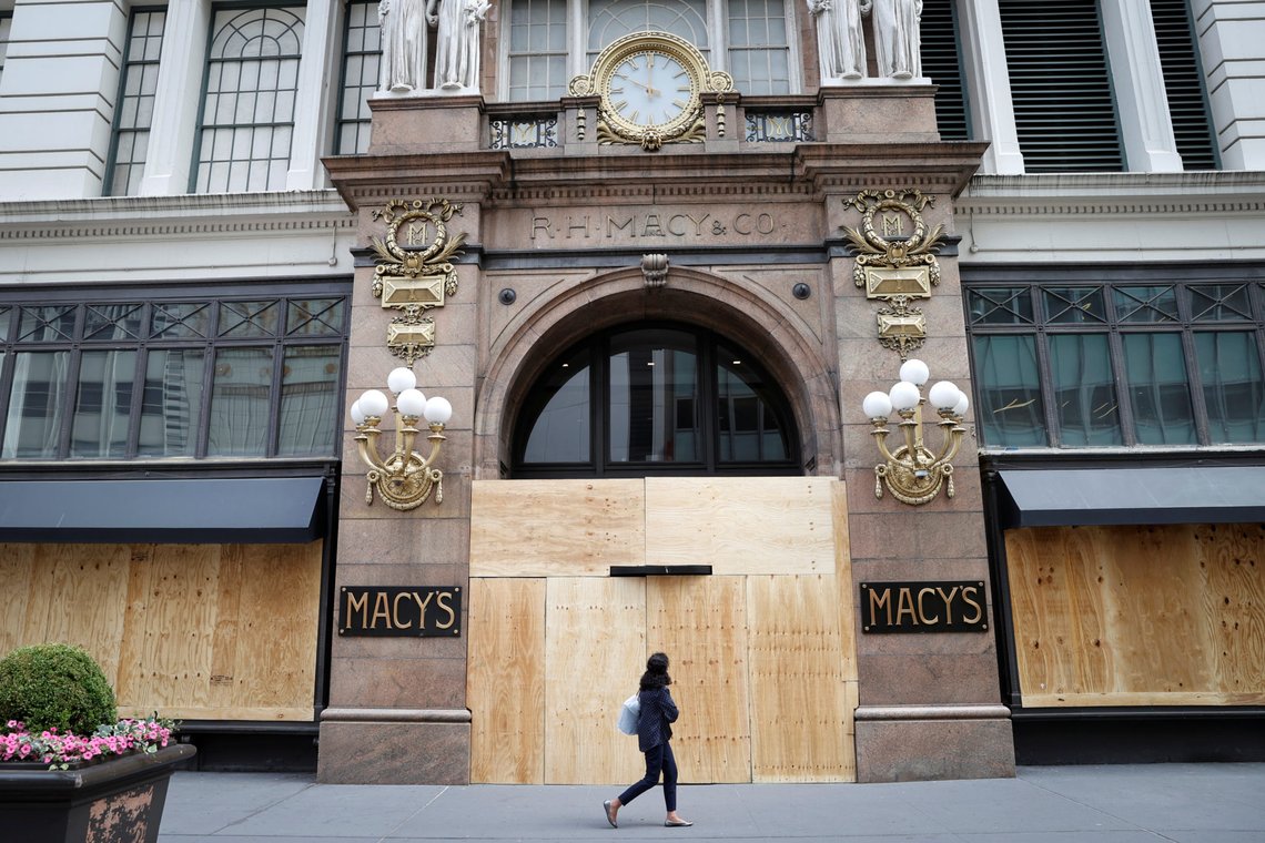 A woman walks past the Macy's store in Herald Square after it was looted and damaged by protesters who participated in demonstrations against the death in Minneapolis police custody of George Floyd, in the Manhattan borough of New York City, U.S., June 2, 2020. REUTERS/Mike Segar A woman walks past the Macy's store in Herald Square after it was looted and damaged by protesters who participated in demonstrations against the death in Minneapolis police custody of George Floyd, in the Manhattan borough of New York City, U.S., June 2, 2020. REUTERS/Mike Segar