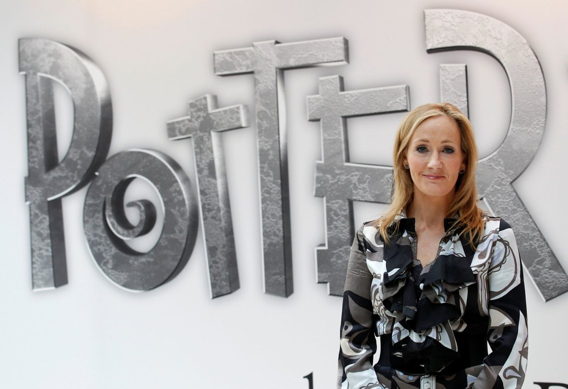 FILE PHOTO: British author JK Rowling, creator of the Harry Potter series of books, poses during the launch of new online website Pottermore in London June 23, 2011. REUTERS/Suzanne Plunkett/File Photo -/File Photo FILE PHOTO: British author JK Rowling, creator of the Harry Potter series of books, poses during the launch of new online website Pottermore in London June 23, 2011. REUTERS/Suzanne Plunkett/File Photo -/File Photo